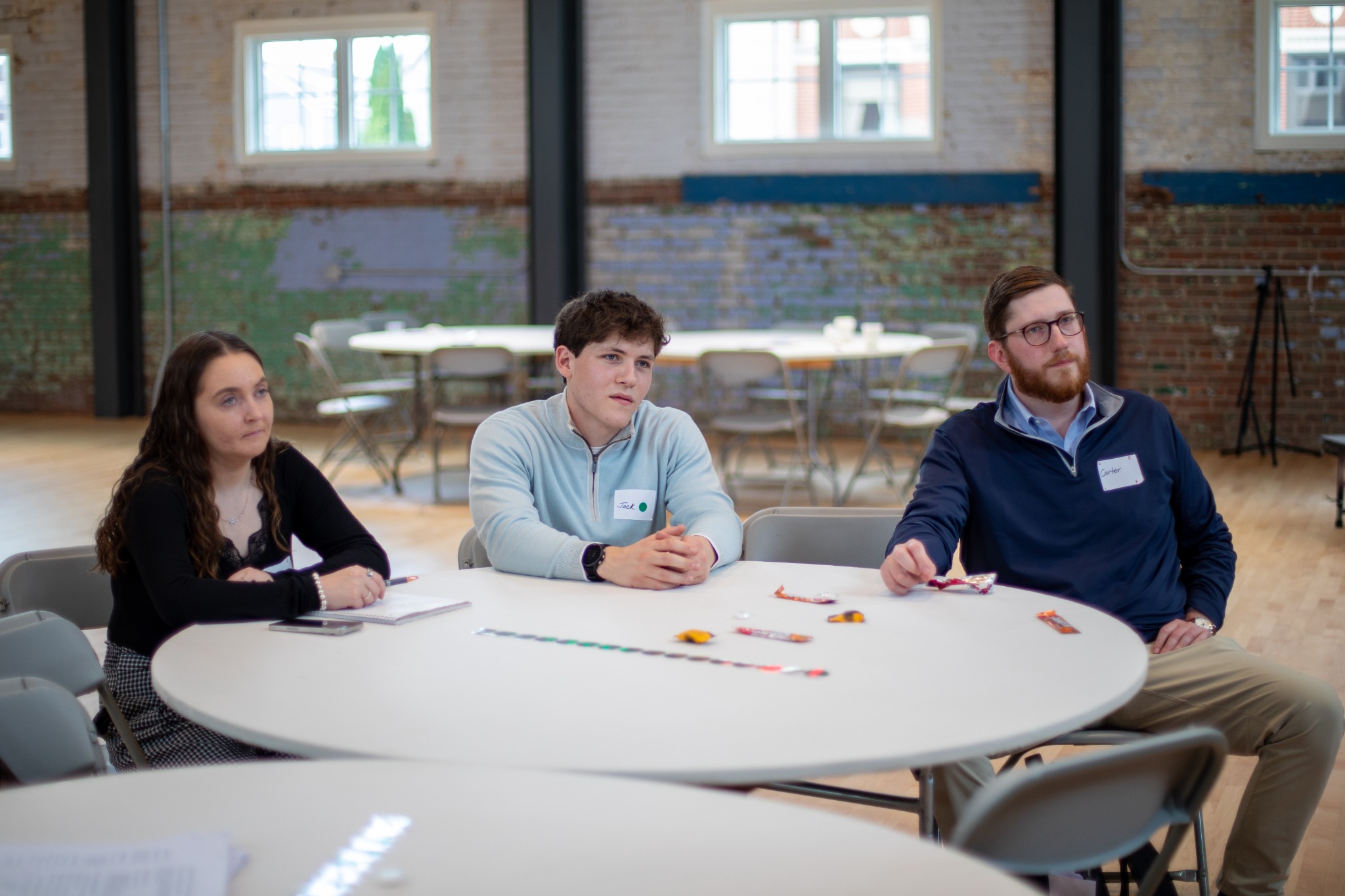 CLC2026 participants gathered around a table in discussion